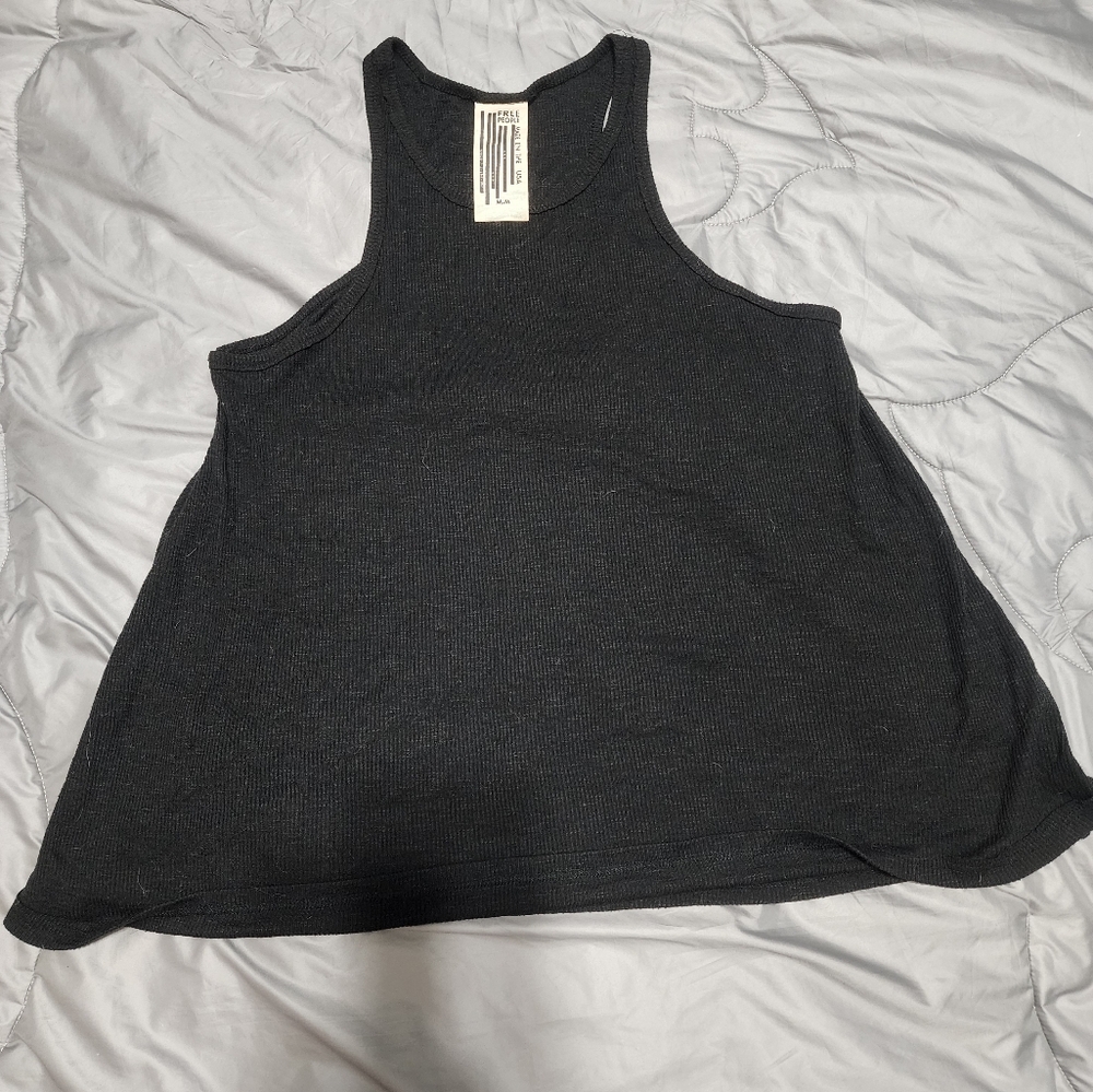 Free People black racer back tank top. EUC. Women's medium. TTS